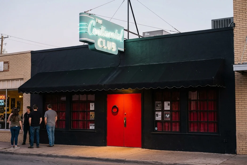 The Continental Club on South Congress Avenue in Austin, a black front with a red door.