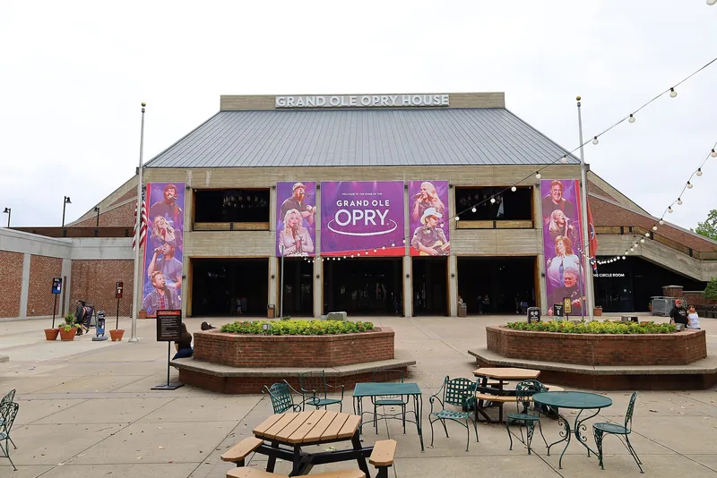 The Grand Ole Opry House in Nashville, a wide brick theater with the Opry name.